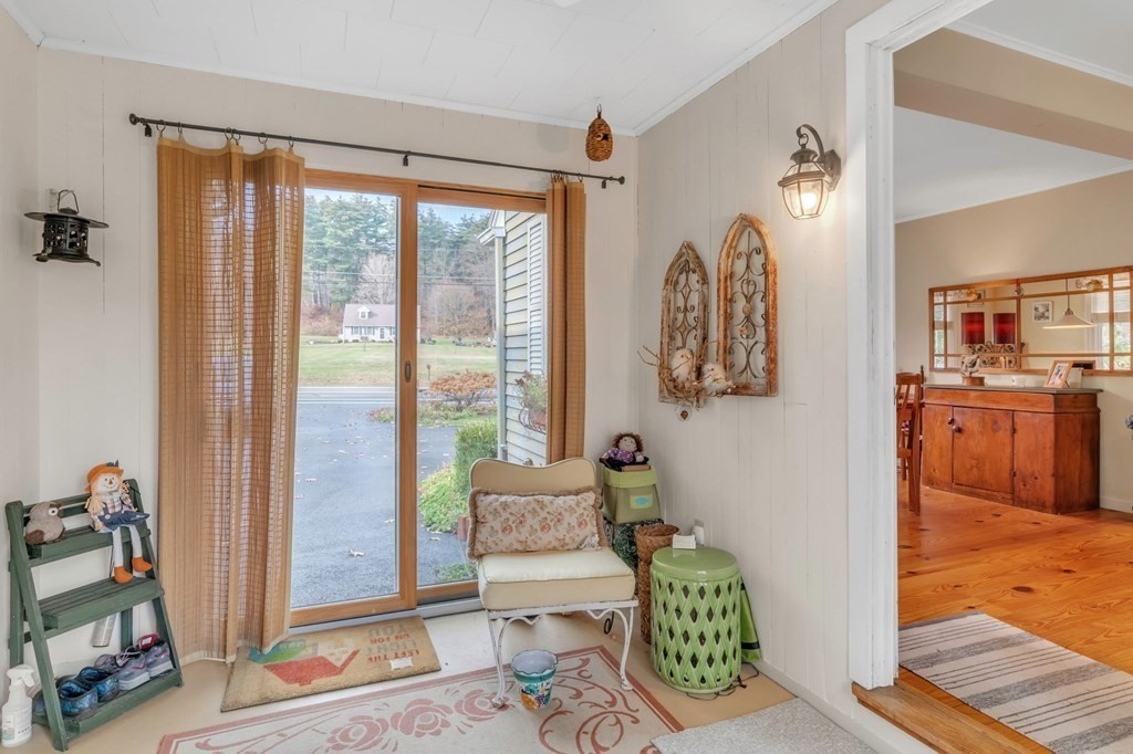 149 Boston Road Palmer, MA 01069 - Photo 6 of 35 a bedroom with furniture and a large window