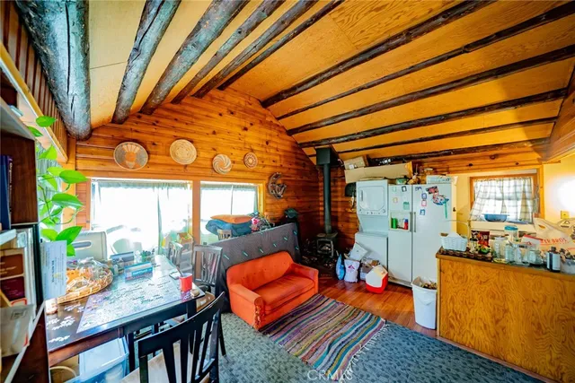 a outdoor space with the couches and dining table view