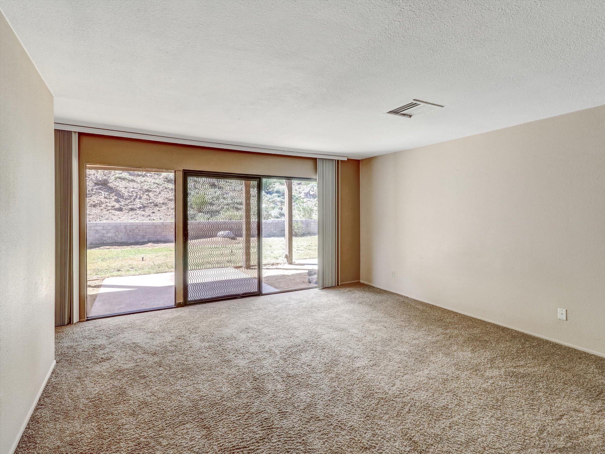 67805 Foothill Road Cathedral City, CA 92234 - Photo 12 of 22 a view of an empty room with a window