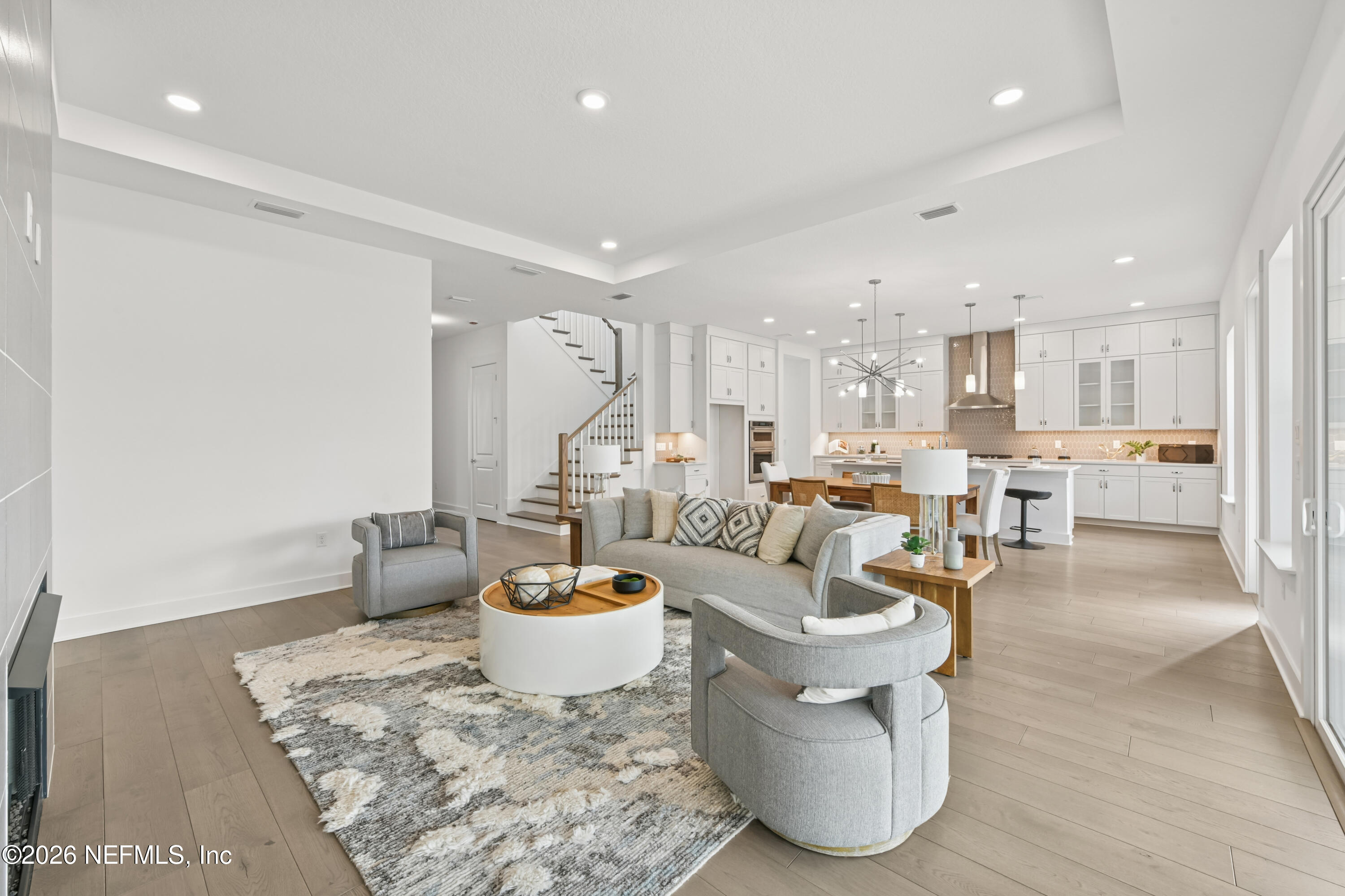 195 Bismarck Palm Road St. Augustine, FL 32092 - Photo 5 of 25 a living room with furniture and a view of kitchen island
