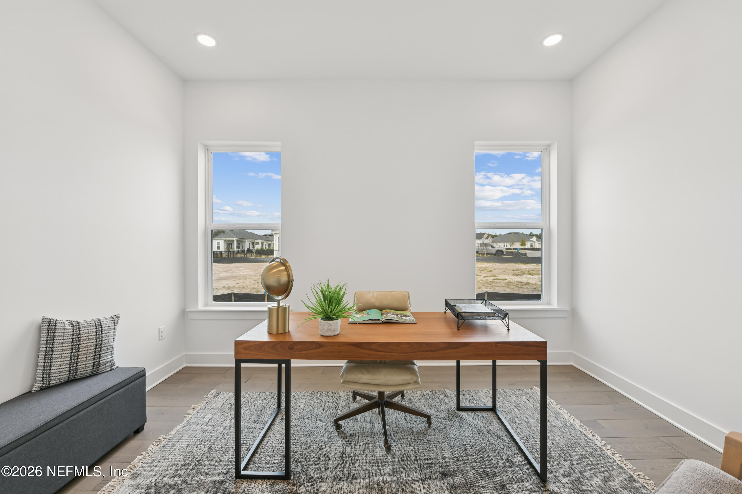 195 Bismarck Palm Road St. Augustine, FL 32092 - Photo 9 of 25 a workspace with furniture and window