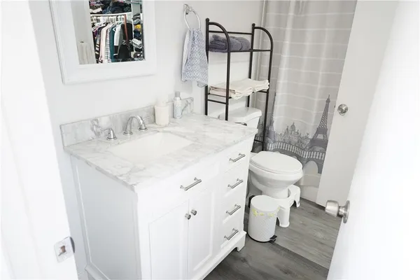 a bed room with a bed and a couch