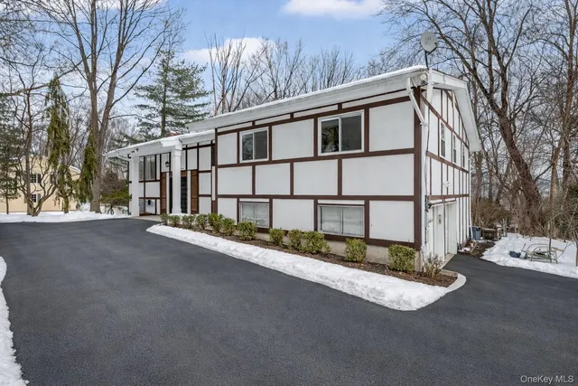 a view of a house with a street