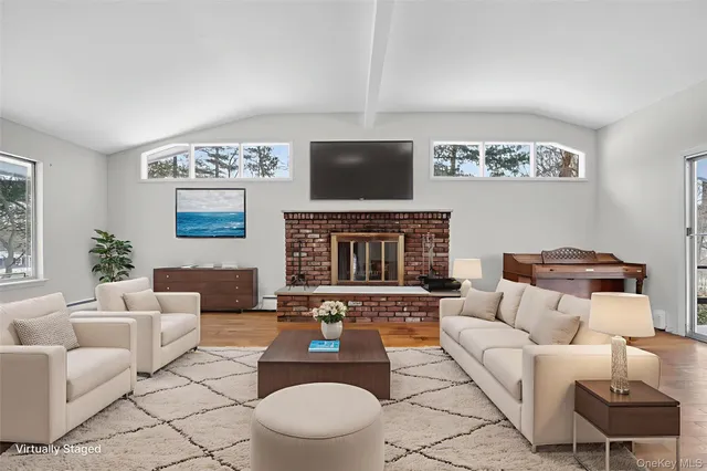 a view of livingroom with furniture and wooden floor