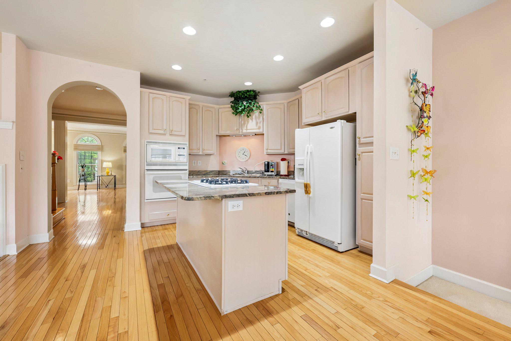 331 Alfandre Street Gaithersburg, MD 20878 - Photo 8 of 38 Charming kitchen with warm wood tones.