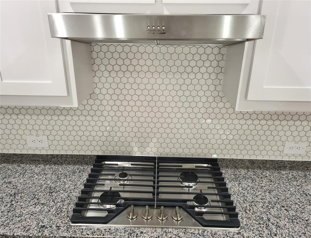 1604 Buzzard Road Denton, TX 76205 - Photo 5 of 22 Stainless Steel Gas Cooktop and Vent-hood with Ducted Exhaust to Outside.