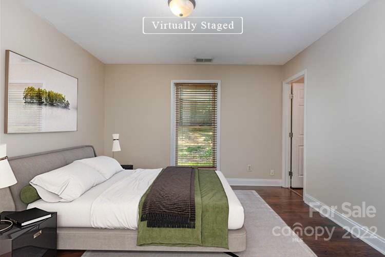 3415 Spring Terrace Lane Charlotte, NC 28269 - Photo 12 of 23 a bedroom with a bed and a window