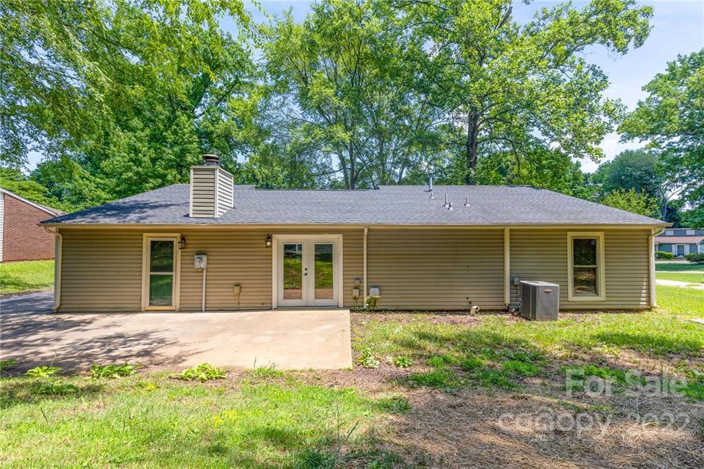 3415 Spring Terrace Lane Charlotte, NC 28269 - Photo 22 of 23 front view of a house with a yard