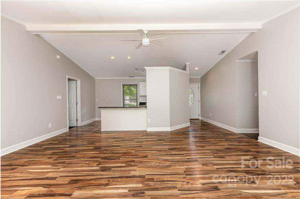 3415 Spring Terrace Lane Charlotte, NC 28269 - Photo 7 of 23 a view of empty room with wooden floor