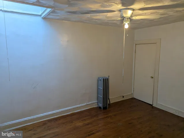 a view of small space with wooden floor