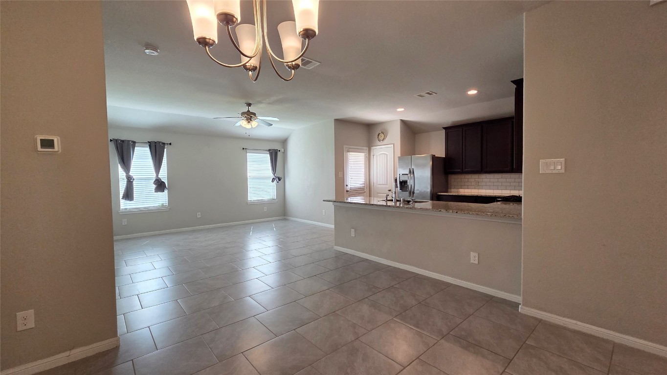 8023 Ecru Lane Rosharon, TX 77583 - Photo 3 of 10 a view of a kitchen with a sink and dishwasher kitchen view