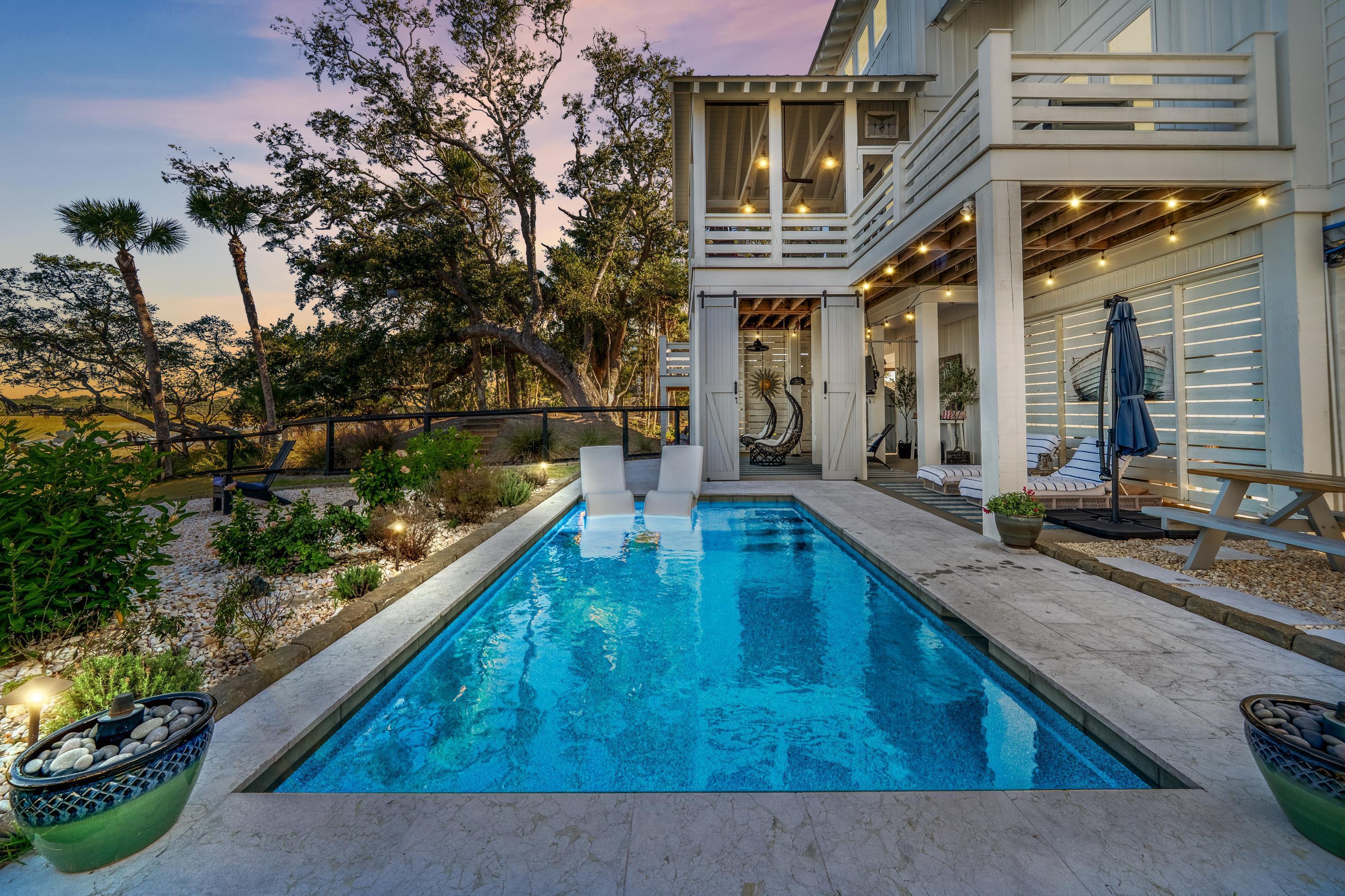 127 Jungle Road Edisto Island, SC 29438 - Photo 47 of 68 127 Jungle Road pool at twilight