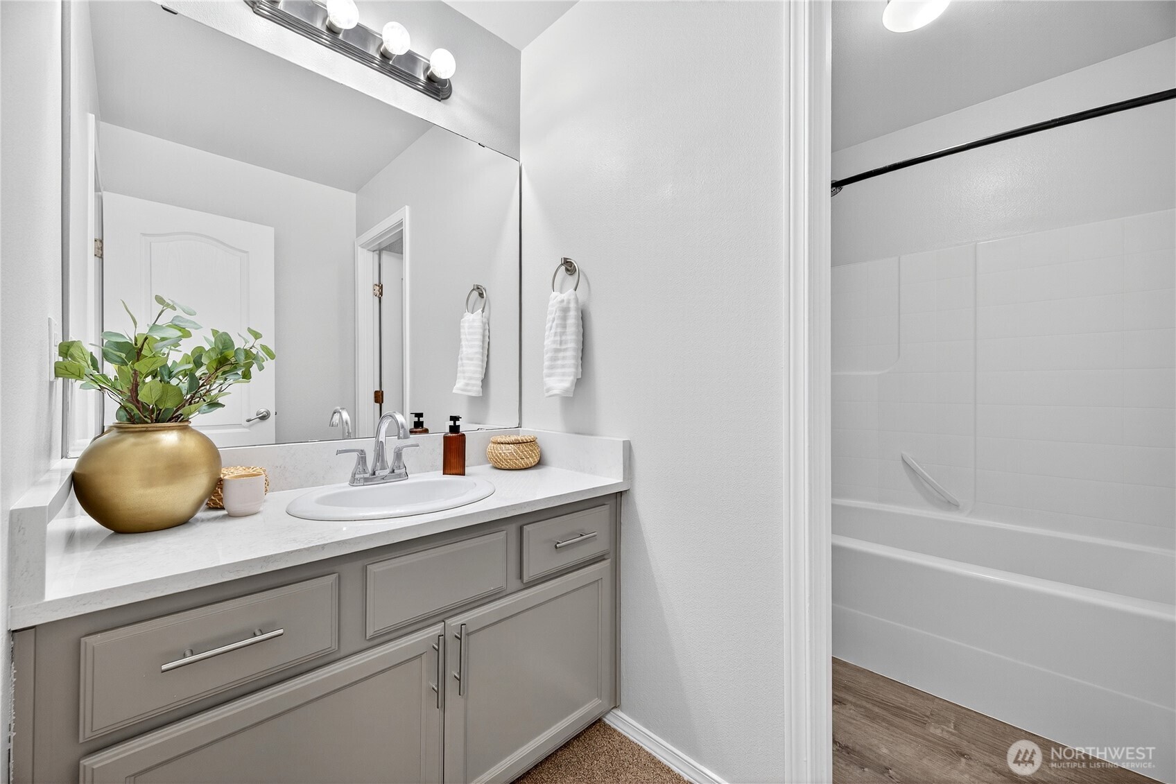 25621 160th Place Southeast Covington, WA 98042 - Photo 21 of 37 a bathroom with a granite countertop sink and a mirror