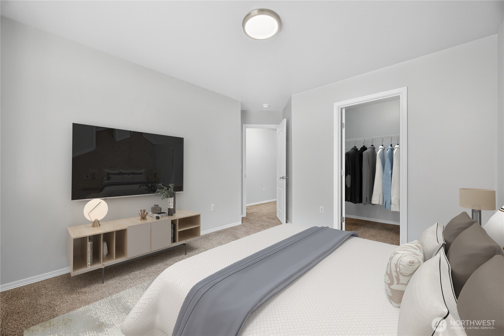 25621 160th Place Southeast Covington, WA 98042 - Photo 22 of 37 a bedroom with a bed and a flat screen tv