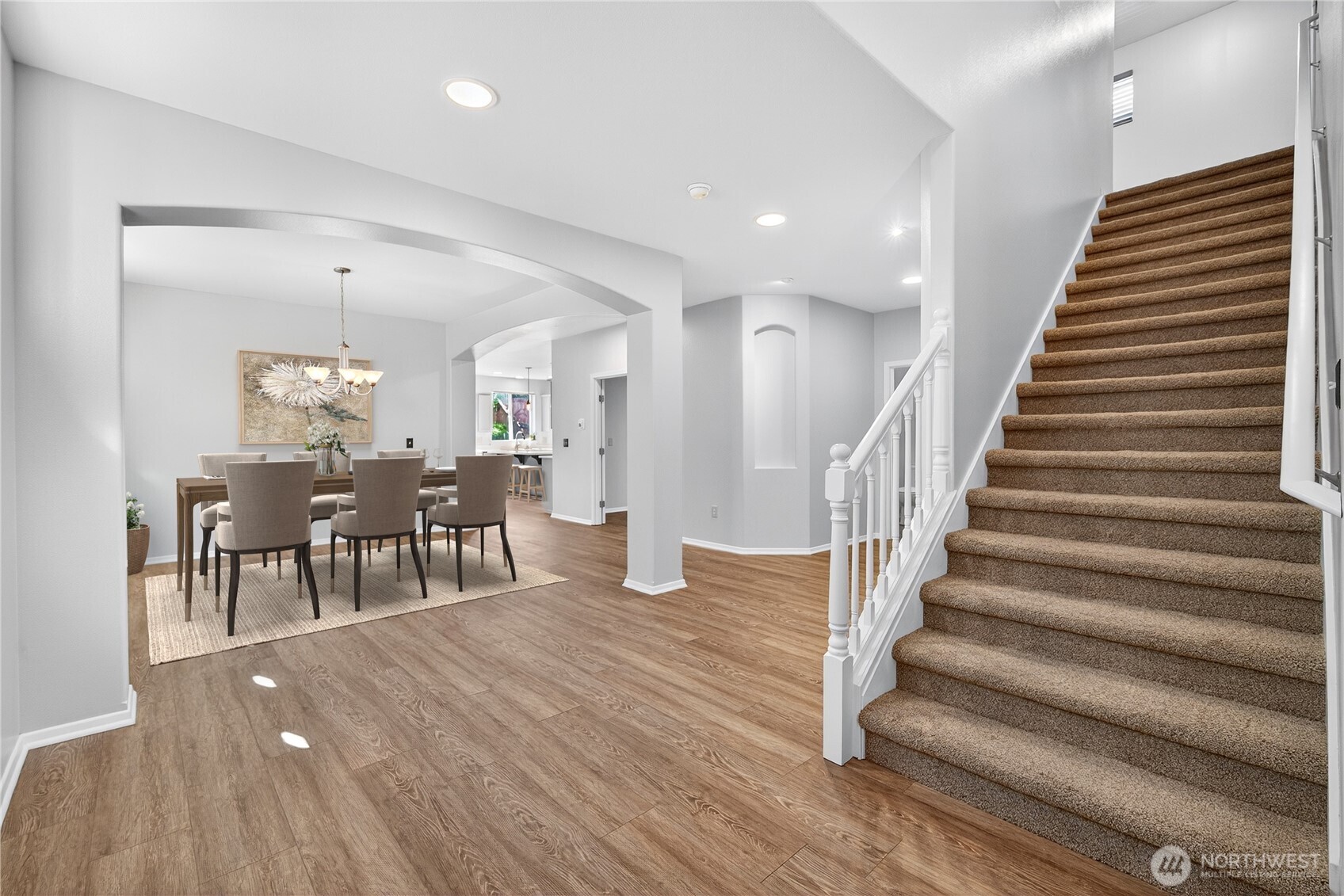 25621 160th Place Southeast Covington, WA 98042 - Photo 10 of 37 a view of a dining room with furniture and wooden floor