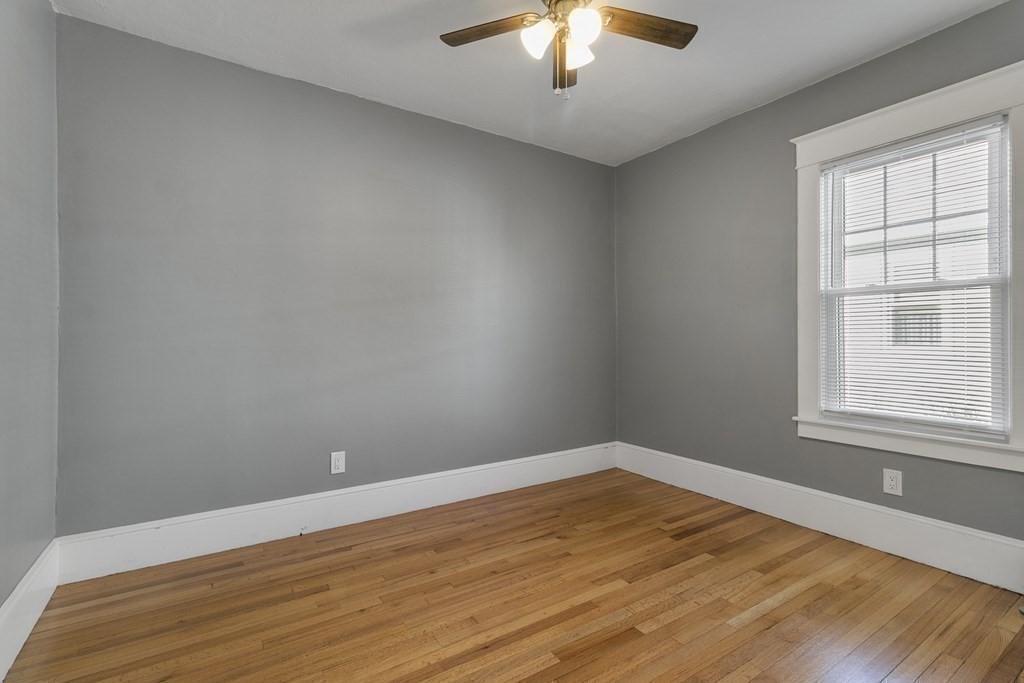 69 Redlands Street Springfield, MA 01104 - Photo 13 of 29 an empty room with a window