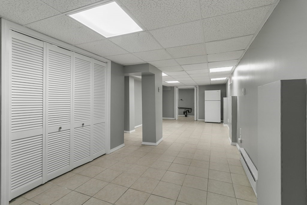 69 Redlands Street Springfield, MA 01104 - Photo 22 of 29 a view of a hallway with closet and entryway