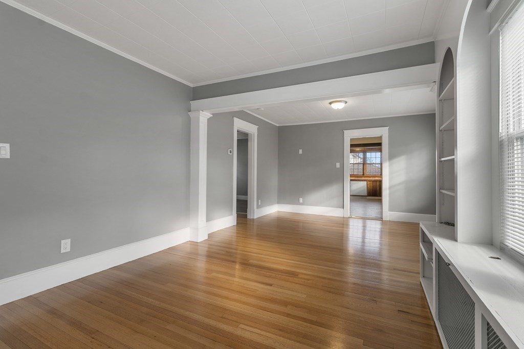 69 Redlands Street Springfield, MA 01104 - Photo 6 of 29 a view of empty room with wooden floor