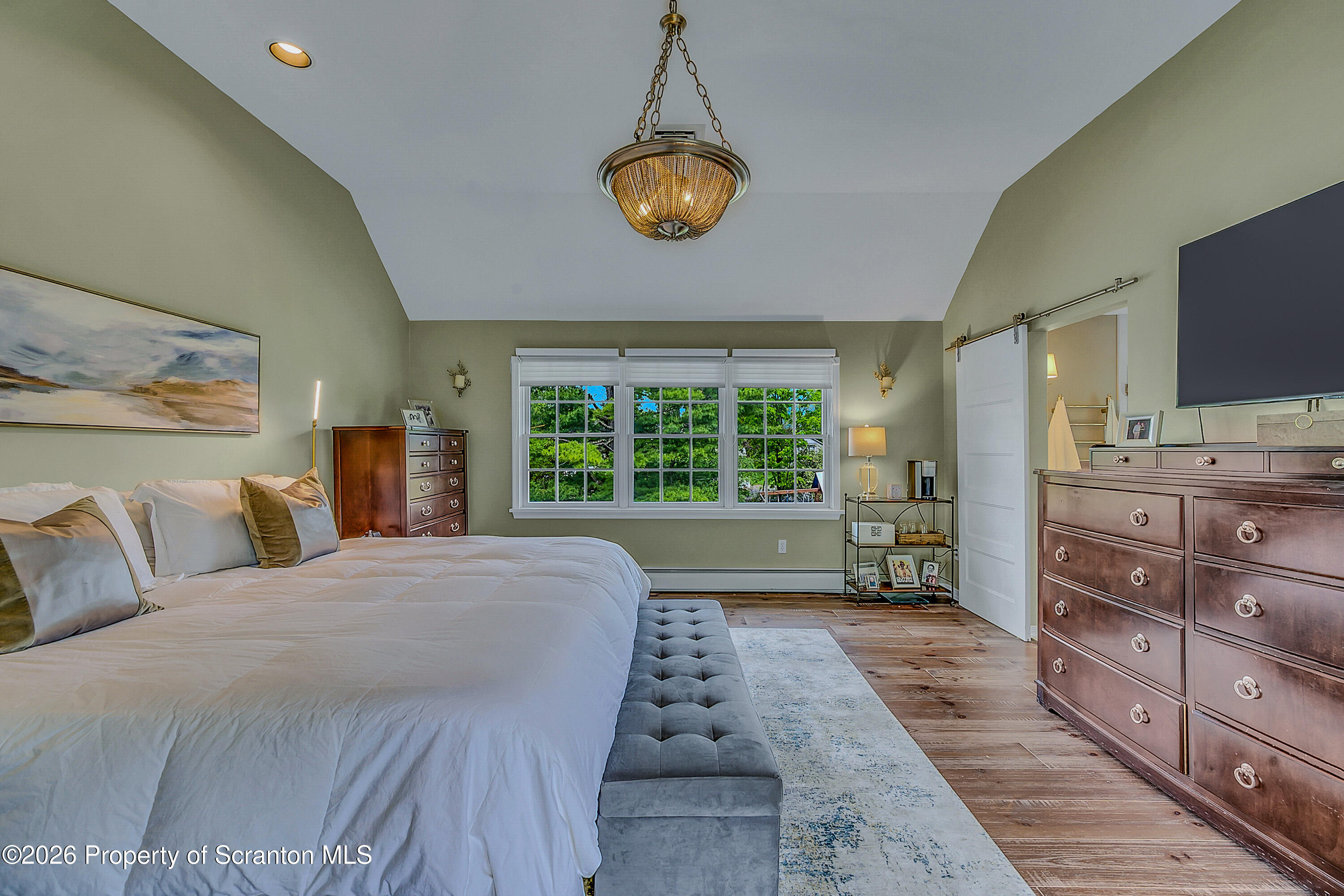 330 Glenburn Road Clarks Green, PA 18411 - Photo 40 of 69 a spacious bedroom with a bed and a flat screen tv