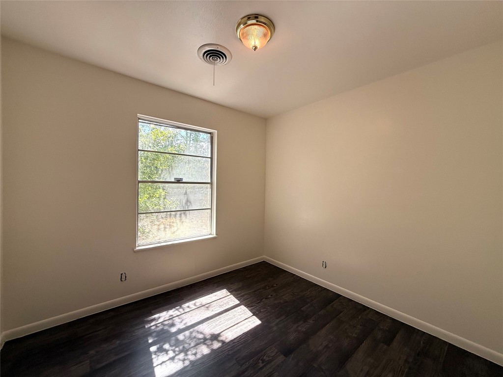 2711 Little John Lane Austin, TX 78704 - Photo 11 of 30 an empty room with windows