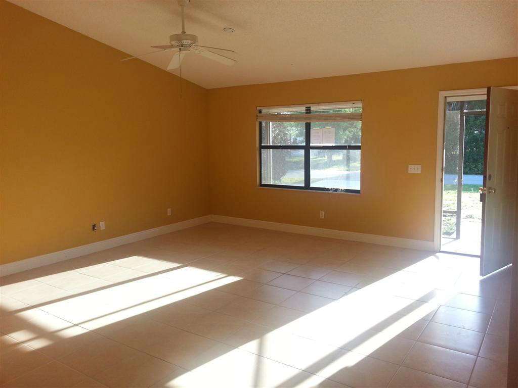 5511 Raintree Trail Fort Pierce, FL 34982 - Photo 2 of 15 Entrance and Living Room
