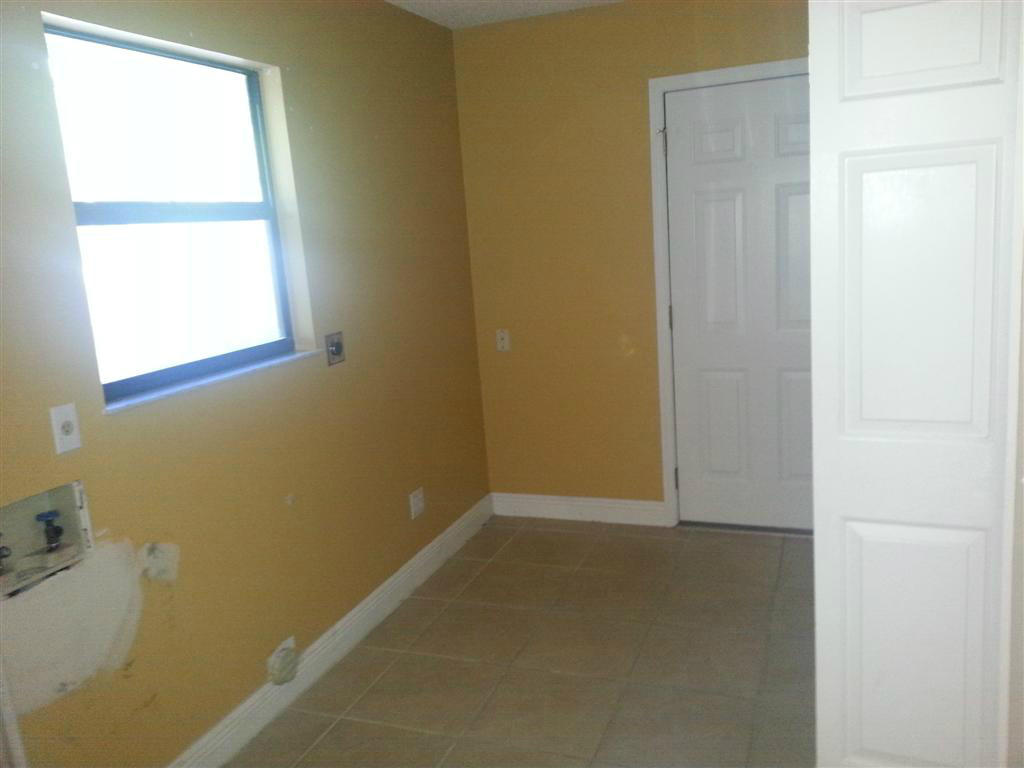 5511 Raintree Trail Fort Pierce, FL 34982 - Photo 7 of 15 Laundry/Pantry