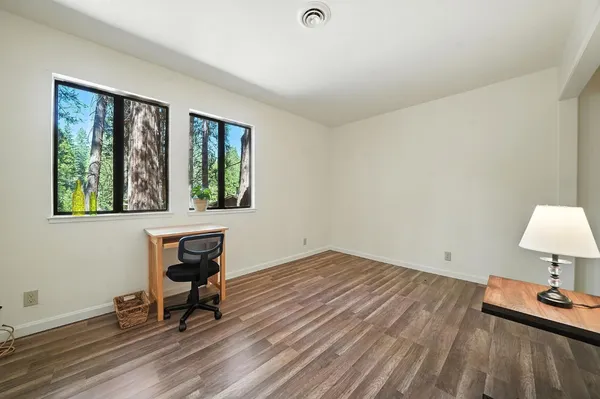 a workspace with wooden floor