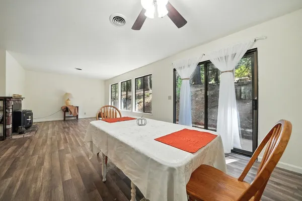 a living room with furniture and a table
