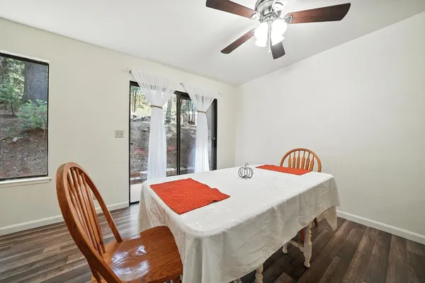 a view of a dining room with furniture