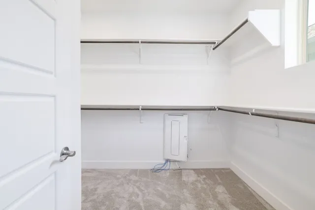 a view of an empty walk in closet