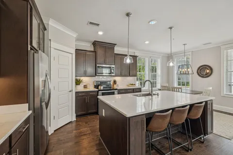 a bedroom with two beds and a window