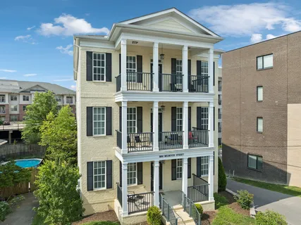 front view of a building with a yard