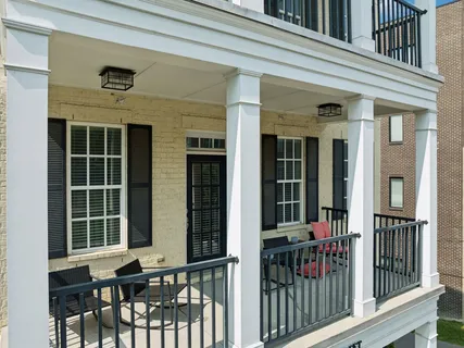 a front view of a building with garden