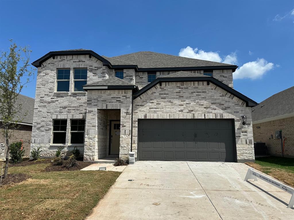 709 Tidal Drive McKinney, TX 75071 - Photo 1 of 1 a front view of a house with yard