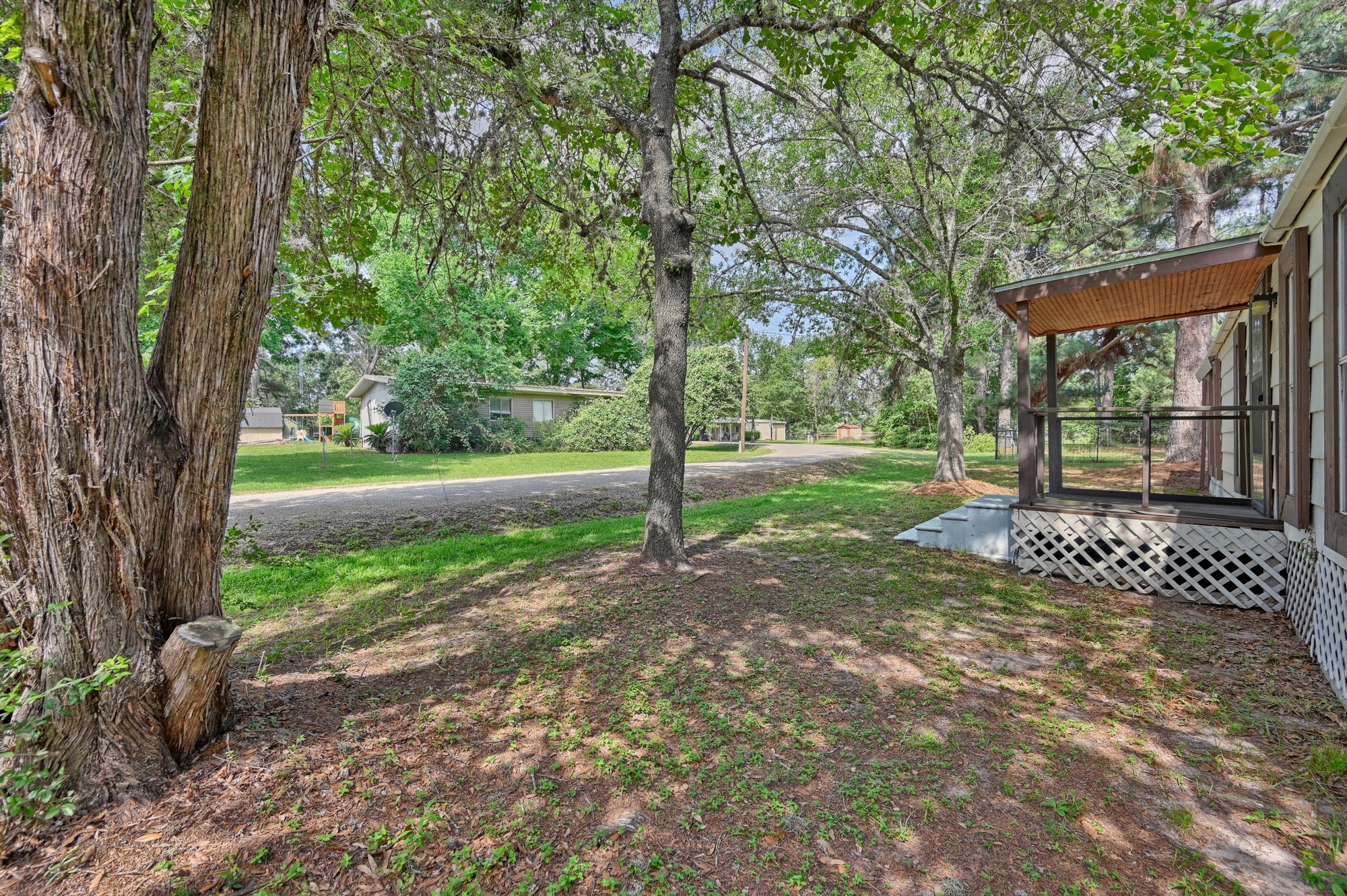 11200 Leisure Road Brenham, TX 77833 - Photo 15 of 23 a view of a yard with a trees