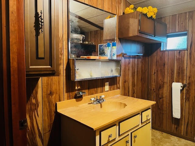 11200 Leisure Road Brenham, TX 77833 - Photo 16 of 23 a bathroom with a sink and a refrigerator