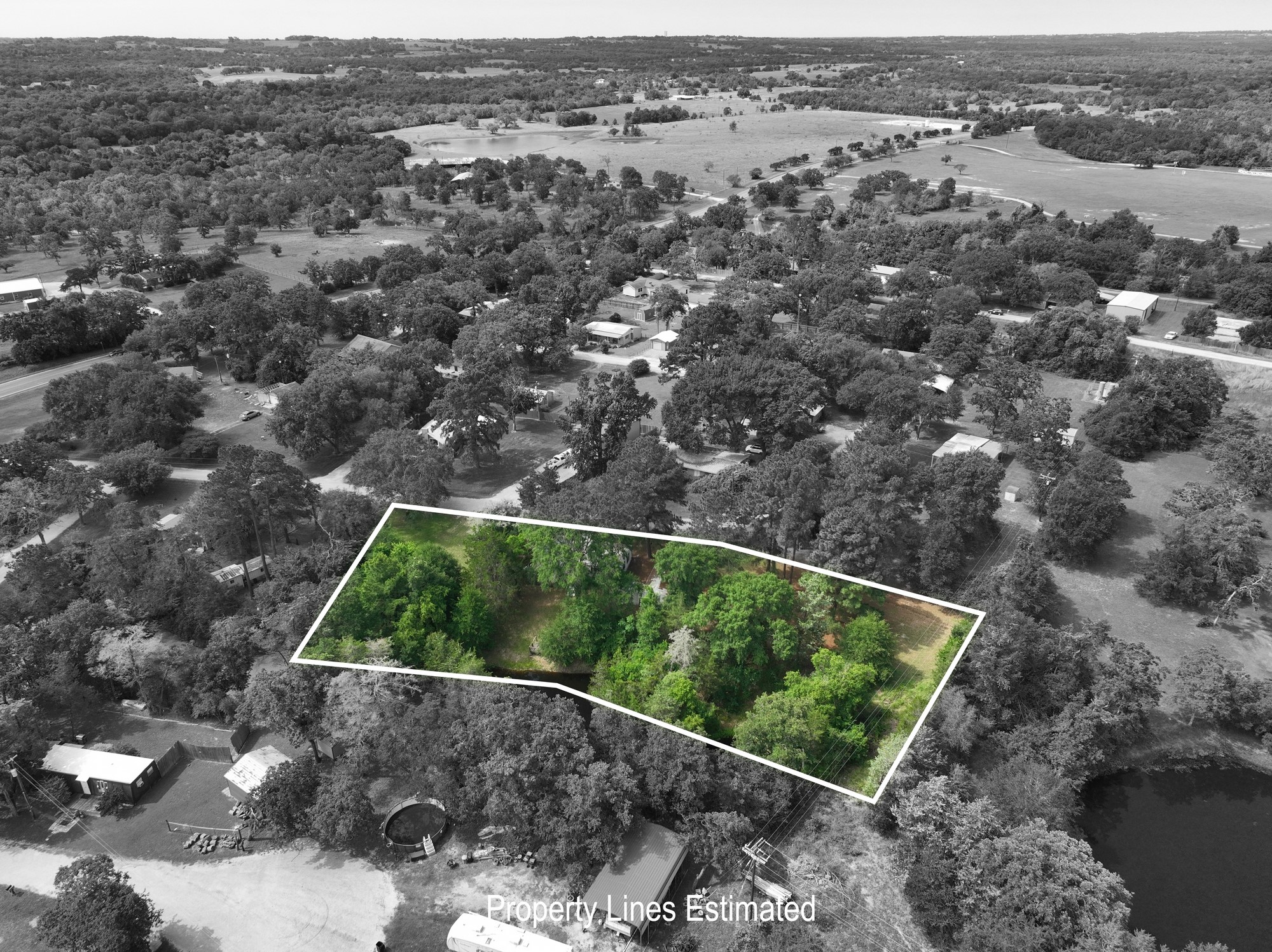11200 Leisure Road Brenham, TX 77833 - Photo 23 of 23 an aerial view of a houses with a yard
