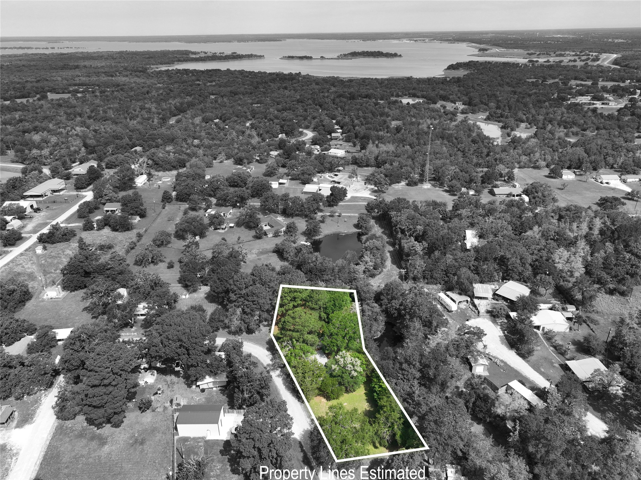 11200 Leisure Road Brenham, TX 77833 - Photo 3 of 23 an aerial view of a residential houses with outdoor space