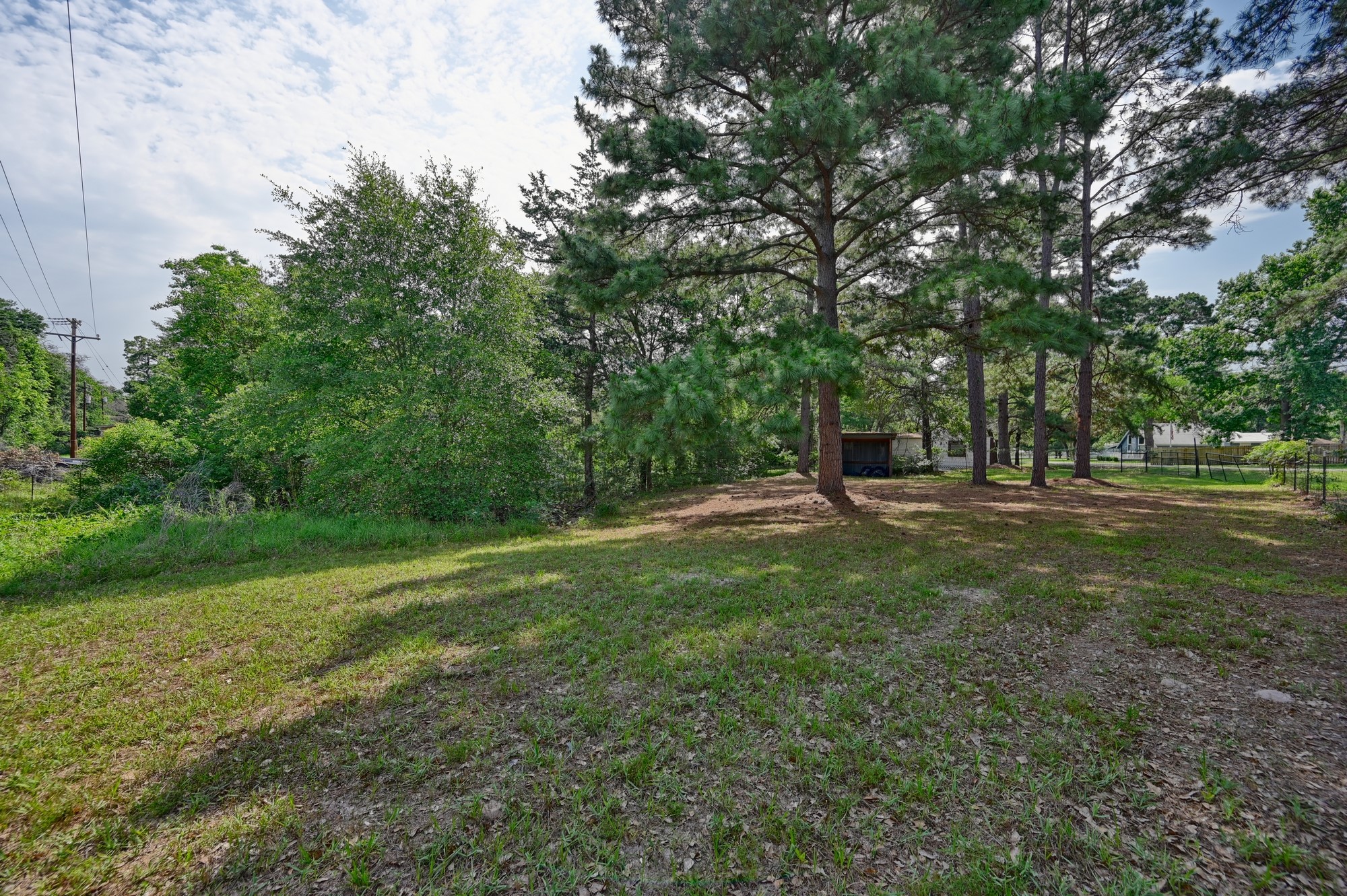 11200 Leisure Road Brenham, TX 77833 - Photo 6 of 23 a view of outdoor space with garden and trees