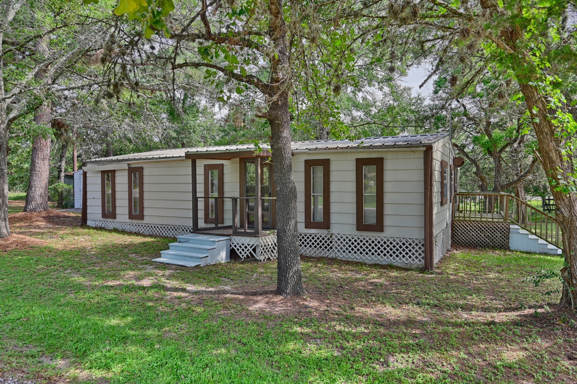 11200 Leisure Road Brenham, TX 77833 - Photo 9 of 23 front view of a house with a yard