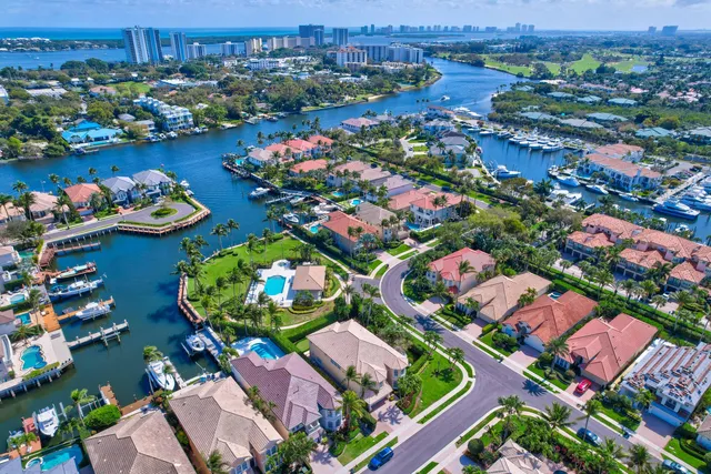 an aerial view of a houses and an outdoor space