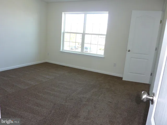 an empty room with closet