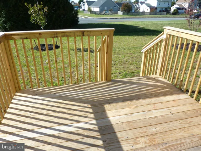 a view of house with a back yard