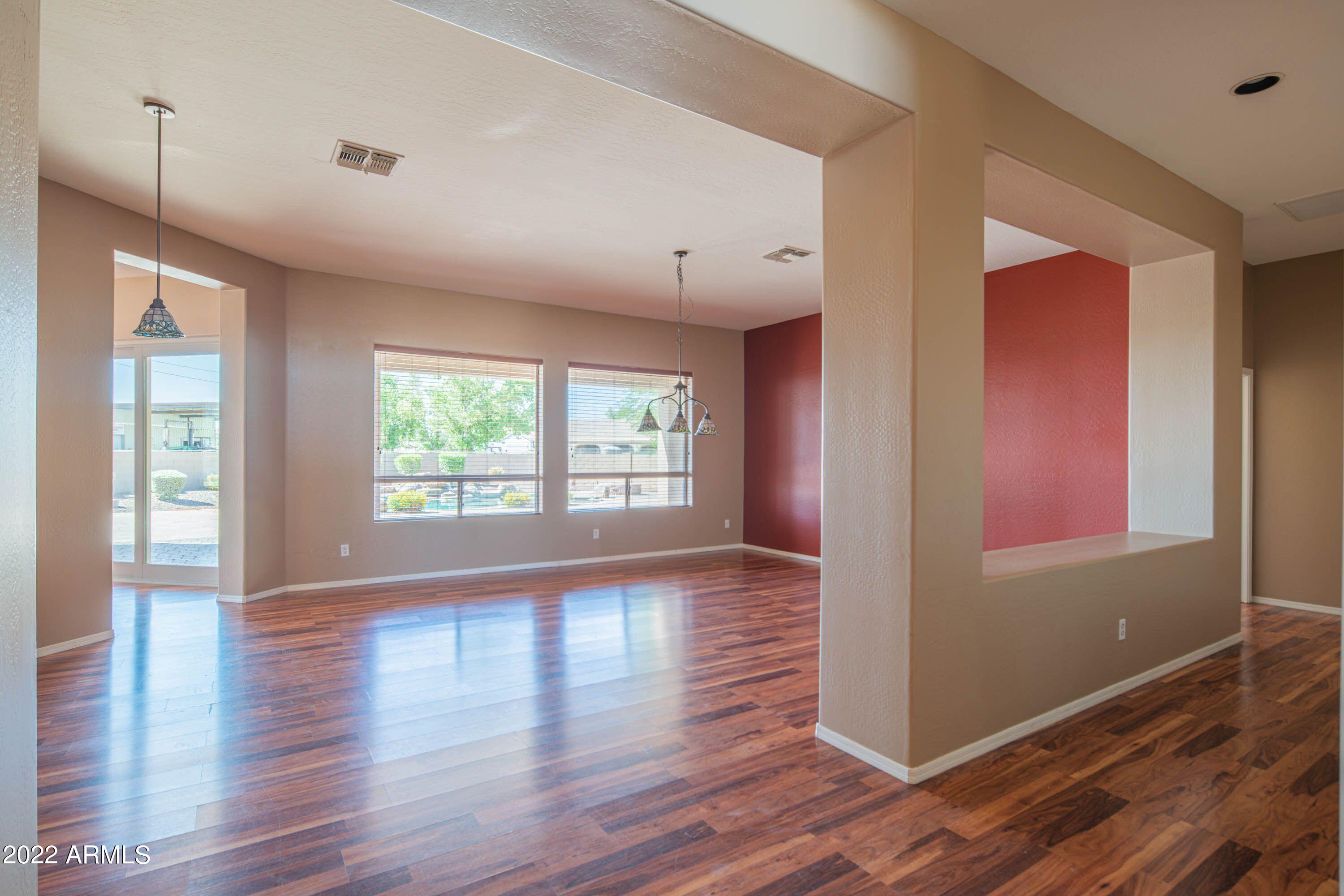 25450 West Riverside Street Buckeye, AZ 85326 - Photo 2 of 34 Buck living dining 2