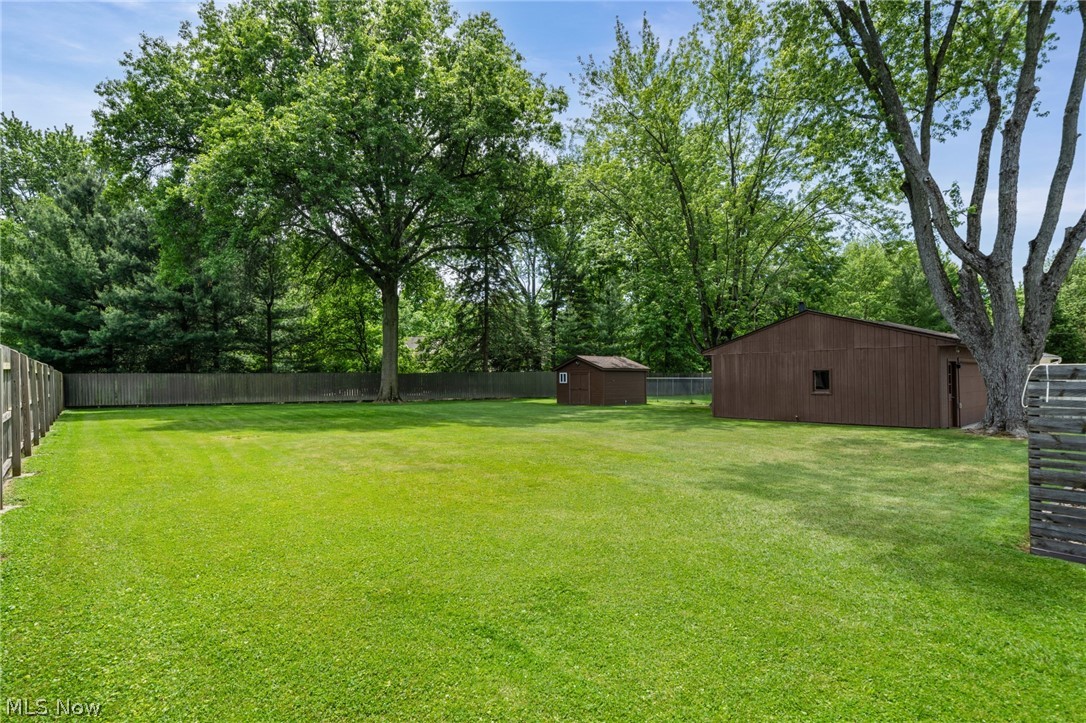 17583 Shurmer Road Strongsville, OH 44136 - Photo 43 of 50 Expansive fenced yard with mature trees
