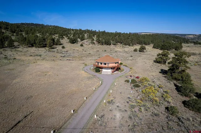 a view of a road with a ocean view