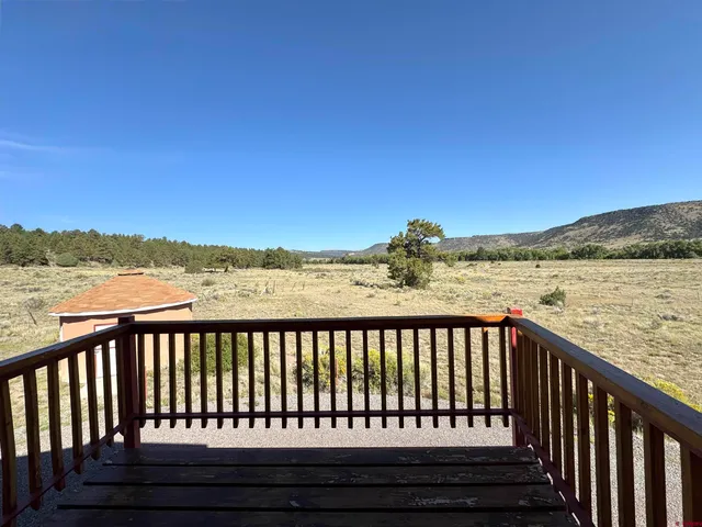 a view of city and roof deck