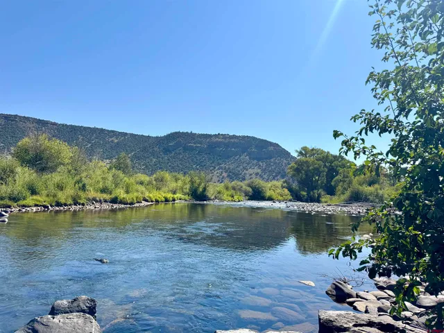 a view of lake with mountain