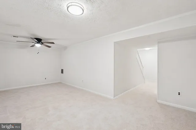 a bathroom with a sink mirror and vanity