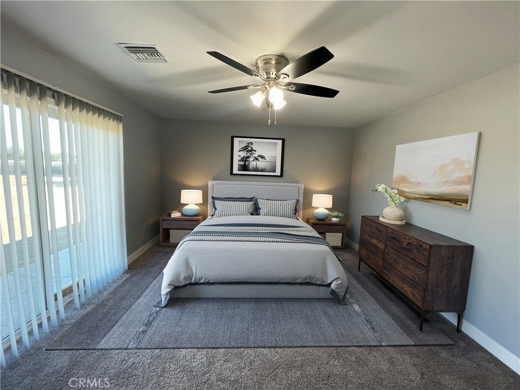 10055 East Ave R 10 Littlerock, CA 93543 - Photo 16 of 31 a bedroom with a bed and window